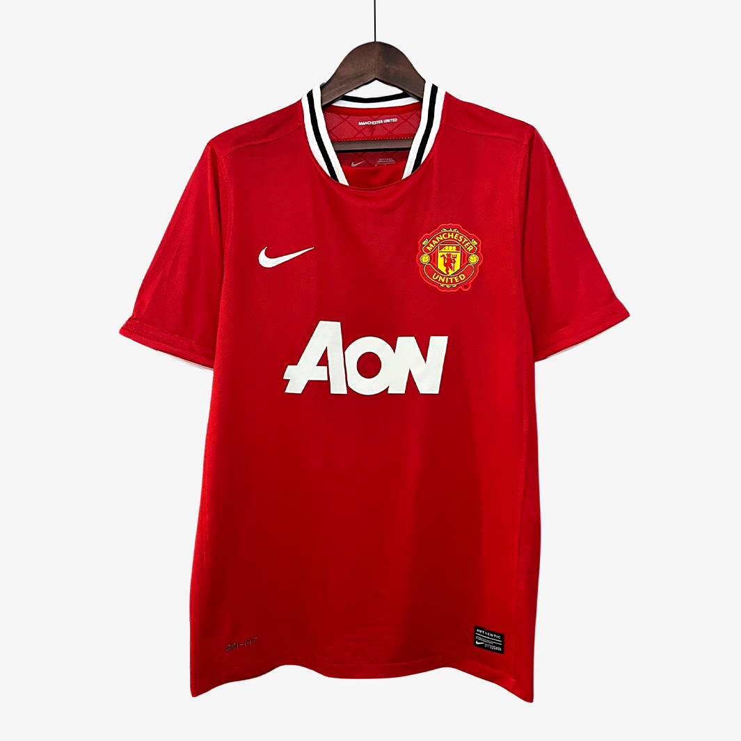 9-18_3d70290c-5092-4218-8a08-9c88b3c89b23 Camiseta Local Manchester United 2011/12 – Versión Retro - Imagen 1